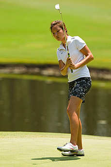 Kristen Park watches her putt on the fifth hole as seen --- b_10GJ__J5F6383